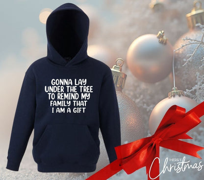 Children’s Christmas Hoodie – “Gonna Lay Under the Tree to Remind My Family That I Am a Gift”